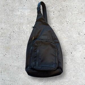 VERA BRADLEY, LARGE BLACK RECYCLED LIGHTEN UP REACTIVE SLING BACKPACK